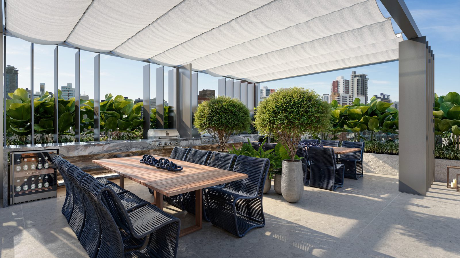 Lumini's rooftop gourmet area, with a grill and wine fridge